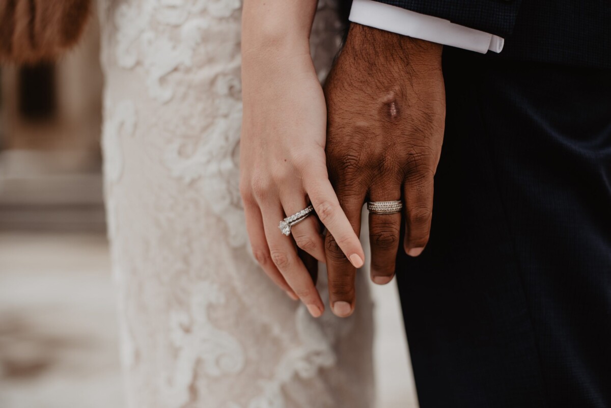 two-persons-wearing-silver-colored-rings-3585798-scaled